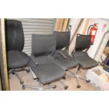 Four Black Swivel Office Chairs