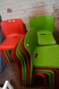 *Six Green and Eight Red Plastic Chairs