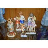 Four Hummel and Goebel Figurines