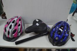 Two Bicycle Helmets, Saddle, and a Pump