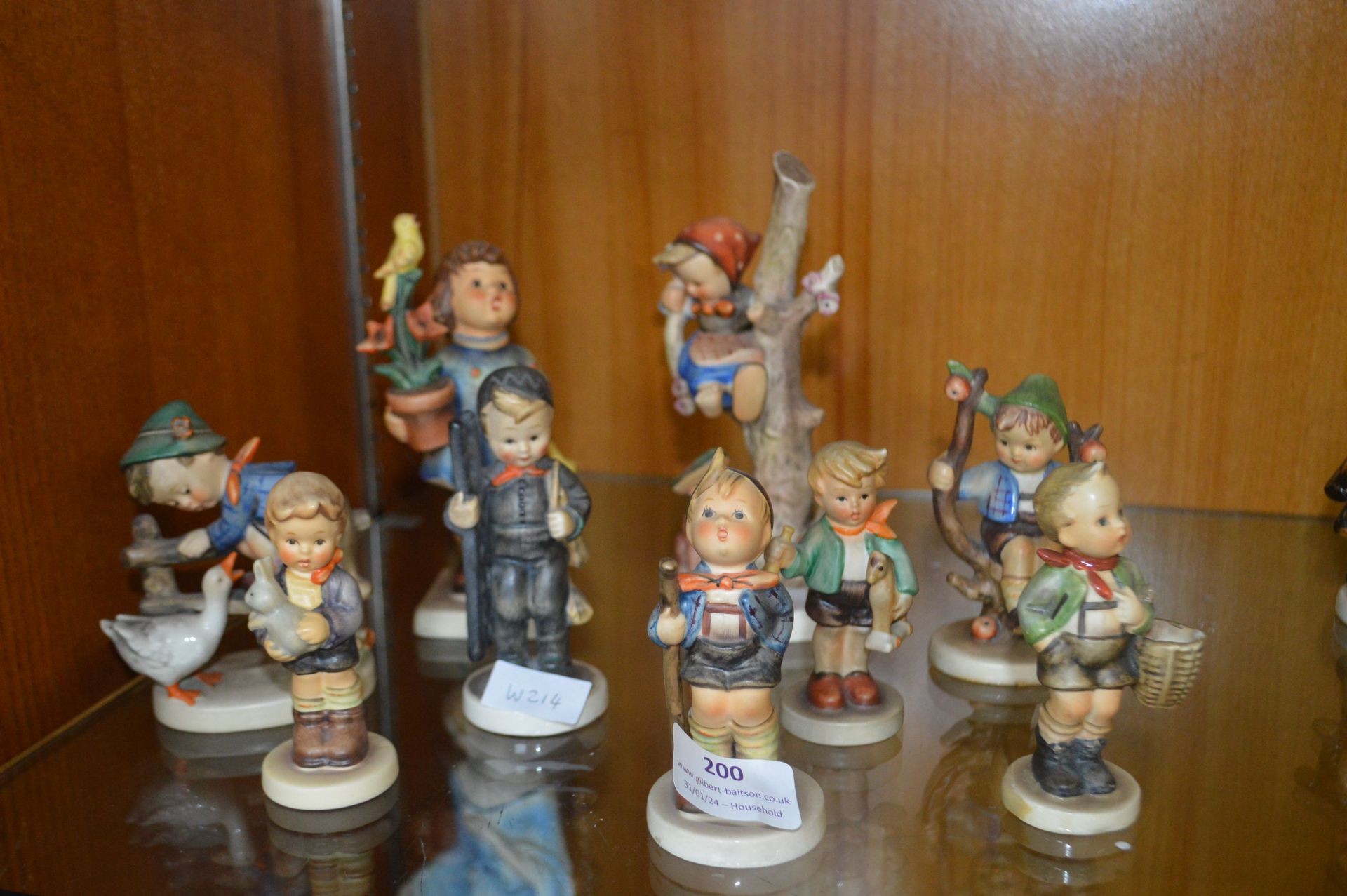 Nine Hummel and Goebel Child Figurines