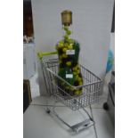 Miniature Shopping Trolley and a Bottle of Decorat