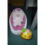 Angel Care Baby Bath Chair, Soft Toy, and a VTech