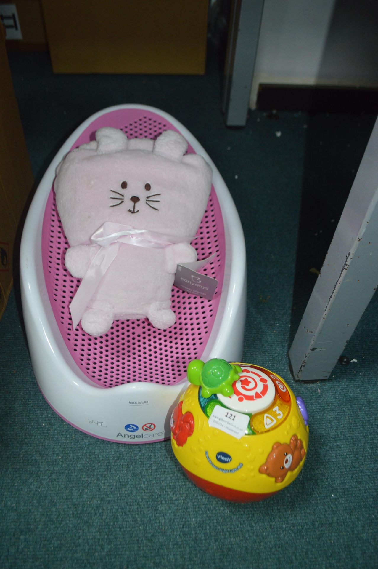 Angel Care Baby Bath Chair, Soft Toy, and a VTech