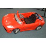 Child's Red Roadster Car with Automatic Lighting a