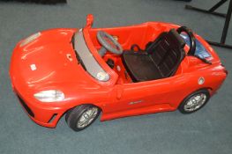 Child's Red Roadster Car with Automatic Lighting a