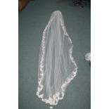 Long Veiling Fitted on Hair Comb