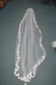 Long Veiling Fitted on Hair Comb