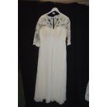 Wedding Dress in Ivory by Kenneth Winston Size: 20