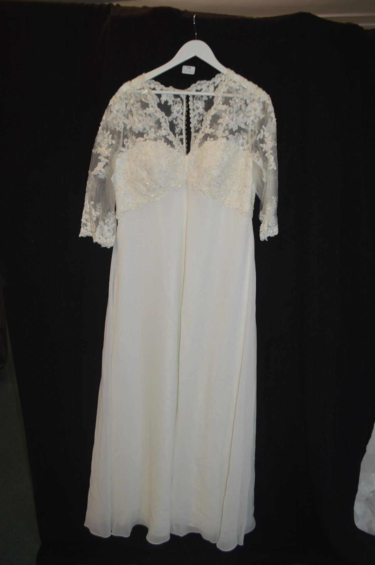 Wedding Dress in Ivory by Kenneth Winston Size: 20