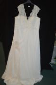 Wedding Dress in Ivory by Victoria Kay Size: 30 (some mark, requires professional spot clean)