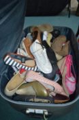 Suitcase Containing Assorted Shoes