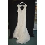 Wedding Dress in Ivory by Madelene Gardner Size: 18