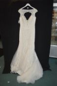 Wedding Dress in Ivory by Madelene Gardner Size: 18