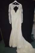 Wedding Dress in Ivory by Madelene Gardner Size: 16
