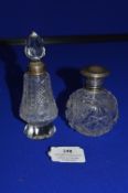 Two Cut Glass Scent Bottles with Silver Collars and Lids