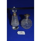 Two Cut Glass Scent Bottles with Silver Collars and Lids