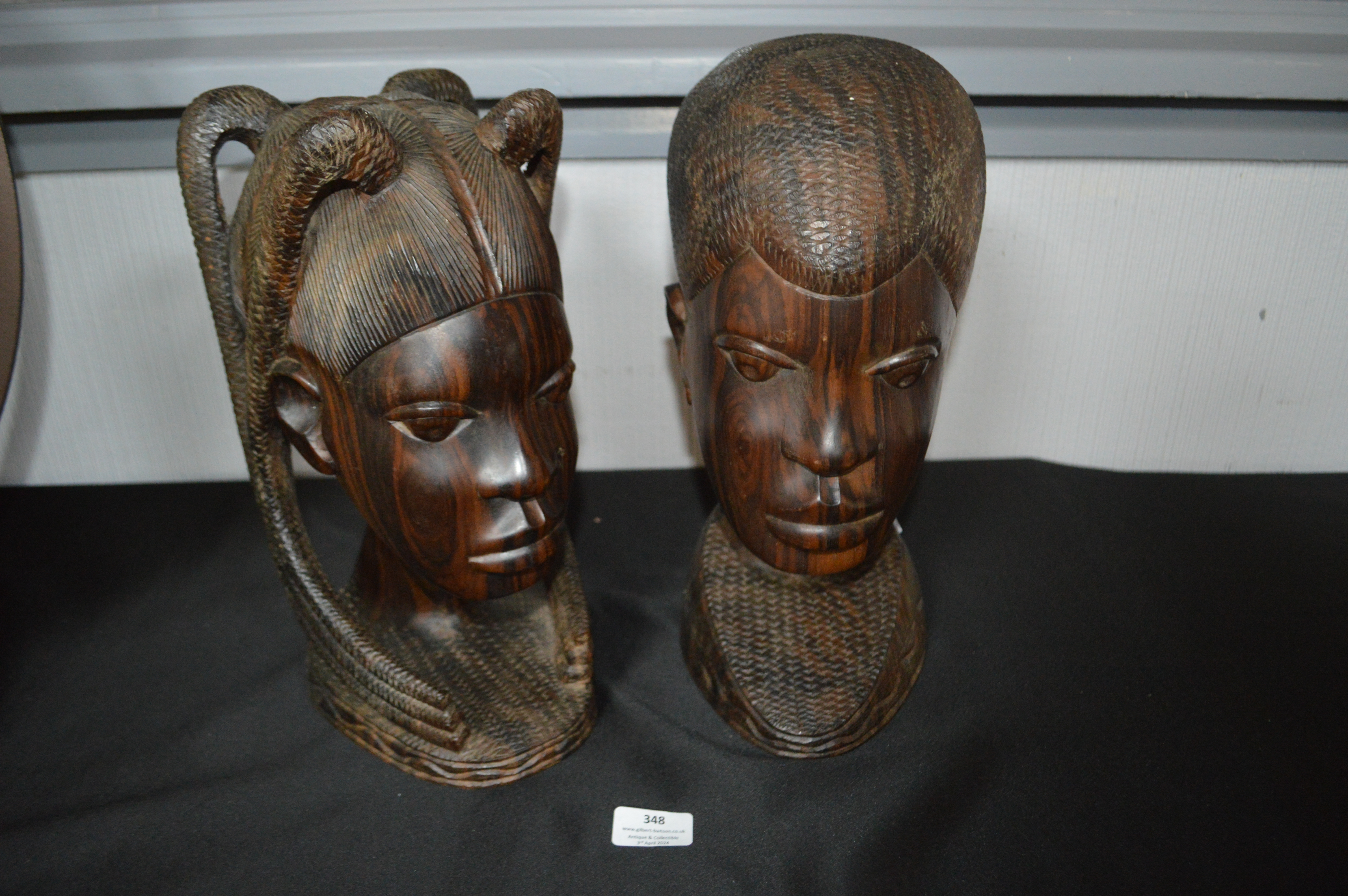 Two Carved Wooden Tribal Heads