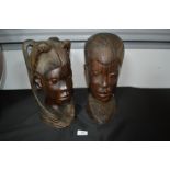 Two Carved Wooden Tribal Heads