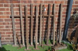 Nine Cast Iron Fence Posts plus Gate Hinges etc.