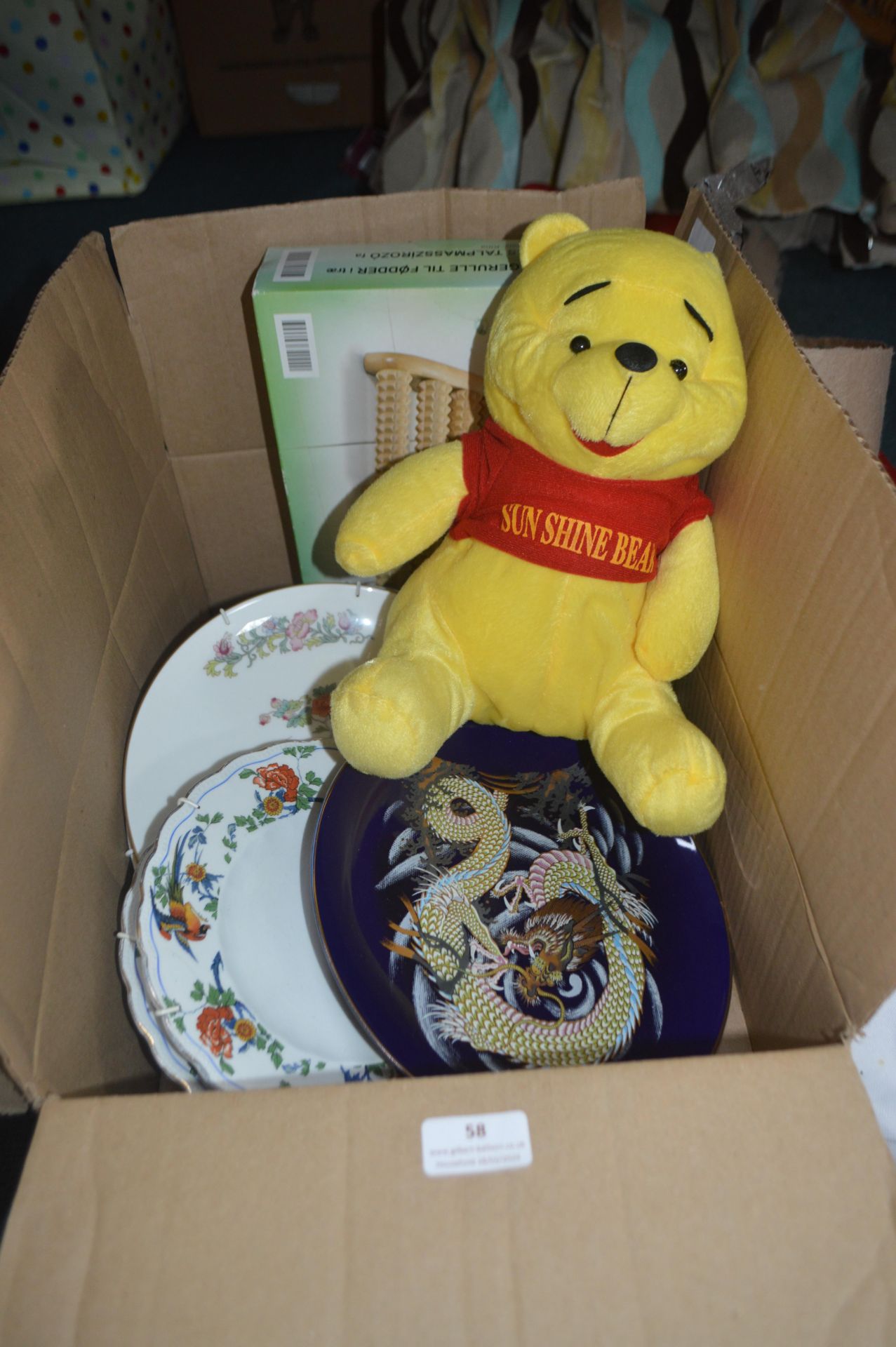 Decorative Plates, Soft Toy Bear, and a Massager