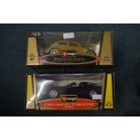 Two Burago Diecast Cars: Volkswagen Beetle, and a