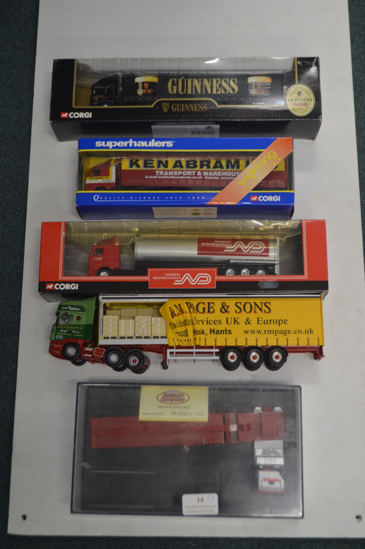 Five Diecast Trucks Including Corgi Guinness