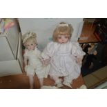 Two Porcelain Heritage Dolls