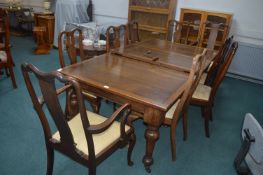 1930's oak Wind Out Dining Table with Nine Mismatc