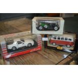 Three Diecast Model Vehicles Including Porsche 944