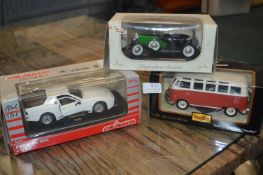 Three Diecast Model Vehicles Including Porsche 944
