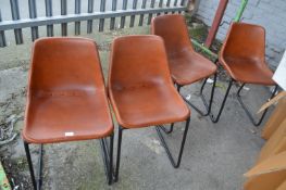 Four Leather Chairs
