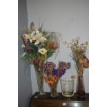 Four Glass Vases and Artificial Flowers