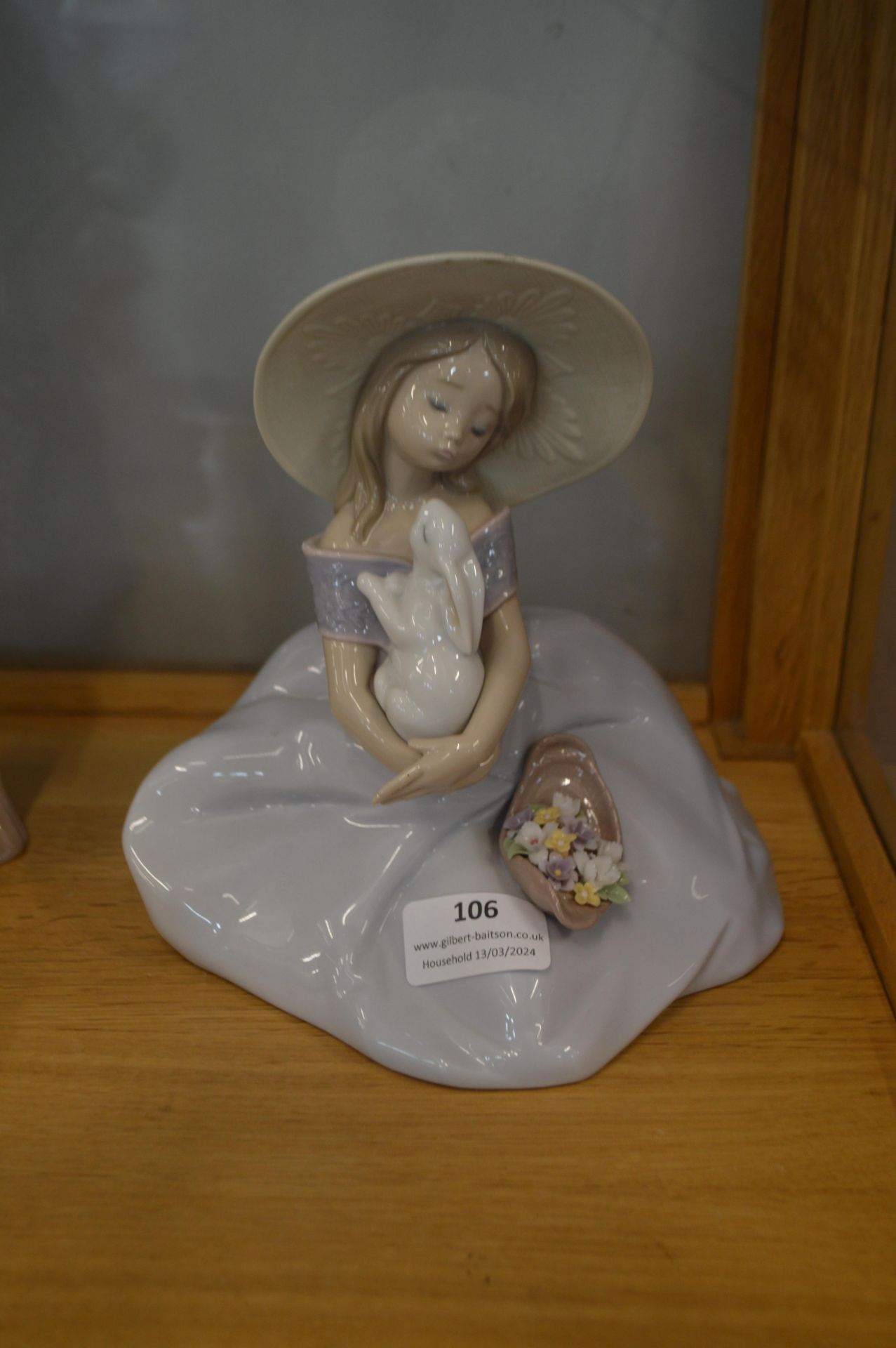 Lladro Figurine of a Seated Girl with a Rabbit