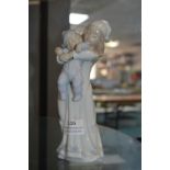 Lladro Figurine of a Girl with a Baby