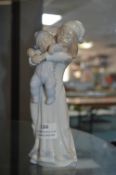 Lladro Figurine of a Girl with a Baby