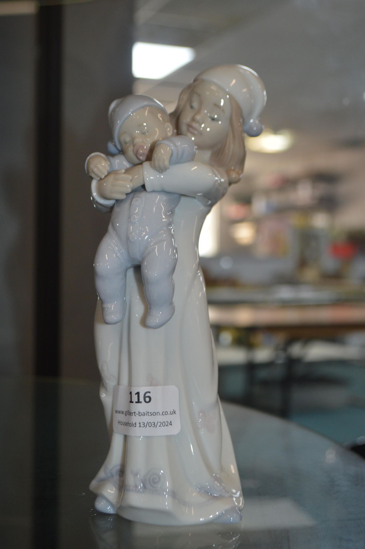 Lladro Figurine of a Girl with a Baby