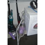 Dyson Vacuum Cleaner and a Hoover Stick vacuum Cle