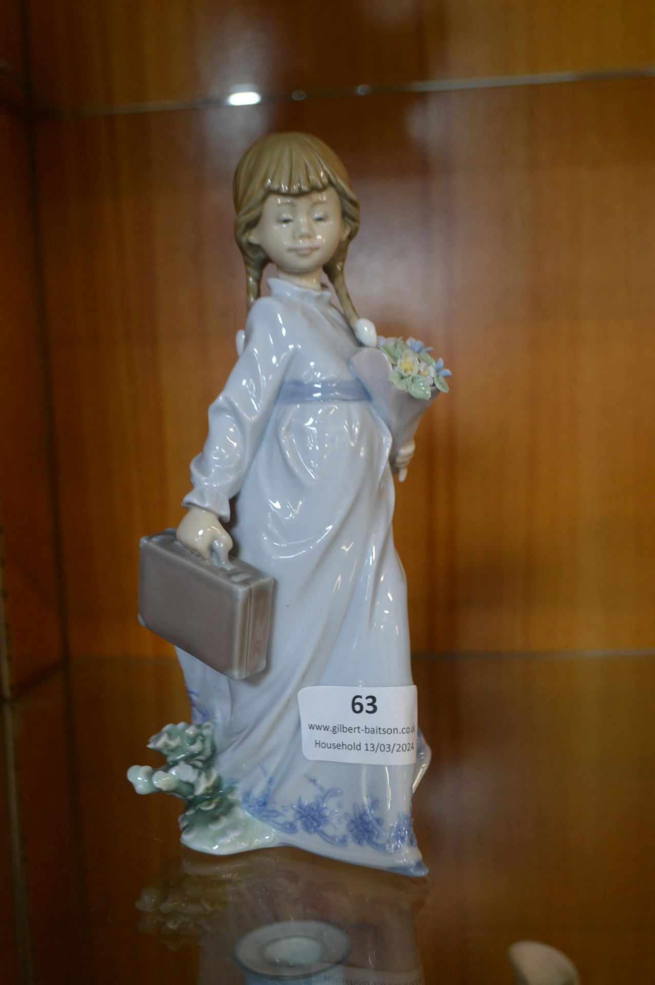 Lladro Figure of a Girl with Flowers