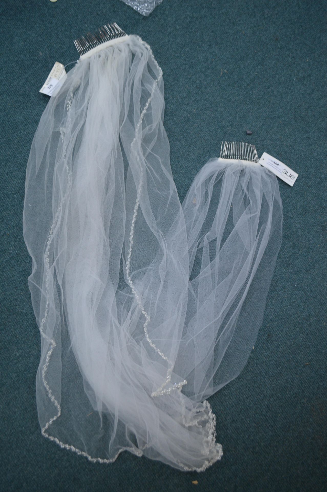 Two Bridal Veils by on Vogue