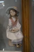 Lladro Figurine of a Seated Girl with Dog