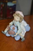 Lladro Figurine of a Girl with a Blue Dog