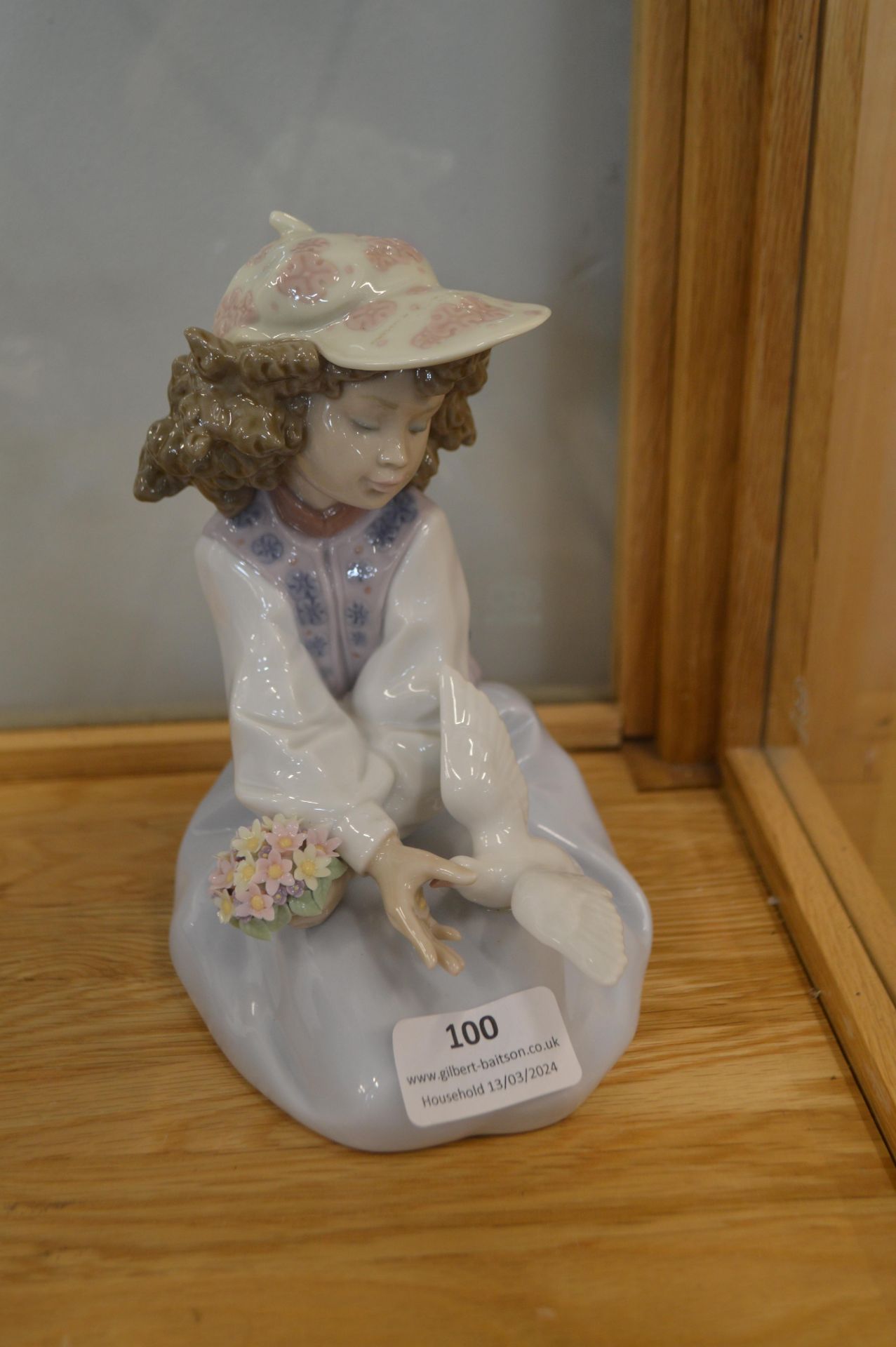 Lladro Figurine of a Seated Girl with a Dove