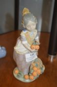 Lladro Figurine of a Girl with Oranges