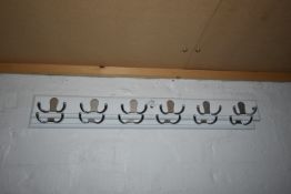 *Twelve Angry Octopus Coat Hooks (Location: 64 King Edward St, Grimsby, DN31 3JP, Viewing Tuesday