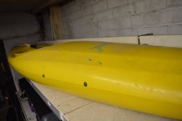 Yellow Kayak with Oar