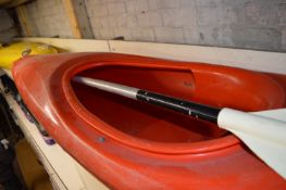 Red Kayak with Oar