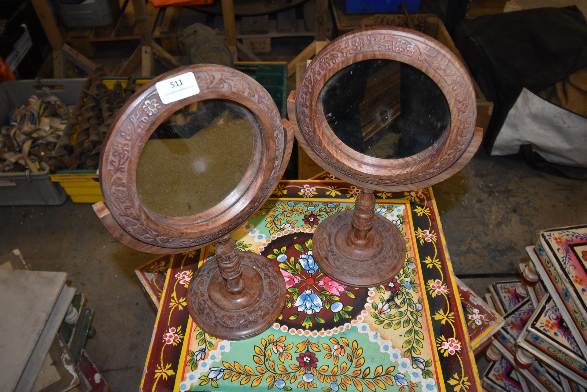 *Pair of Carved Indian Teak Circular Mirrors