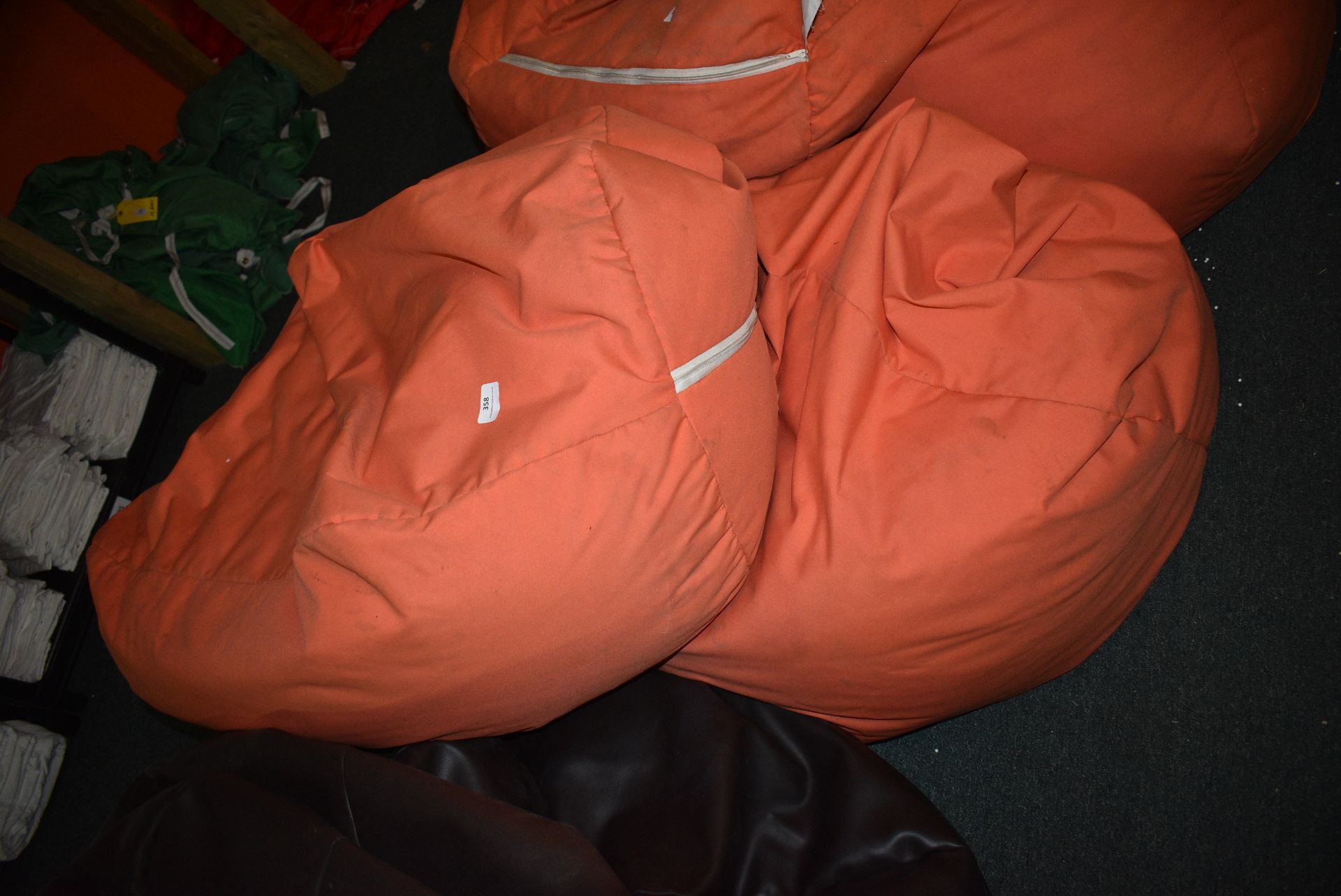 *Three Orange Beanbags