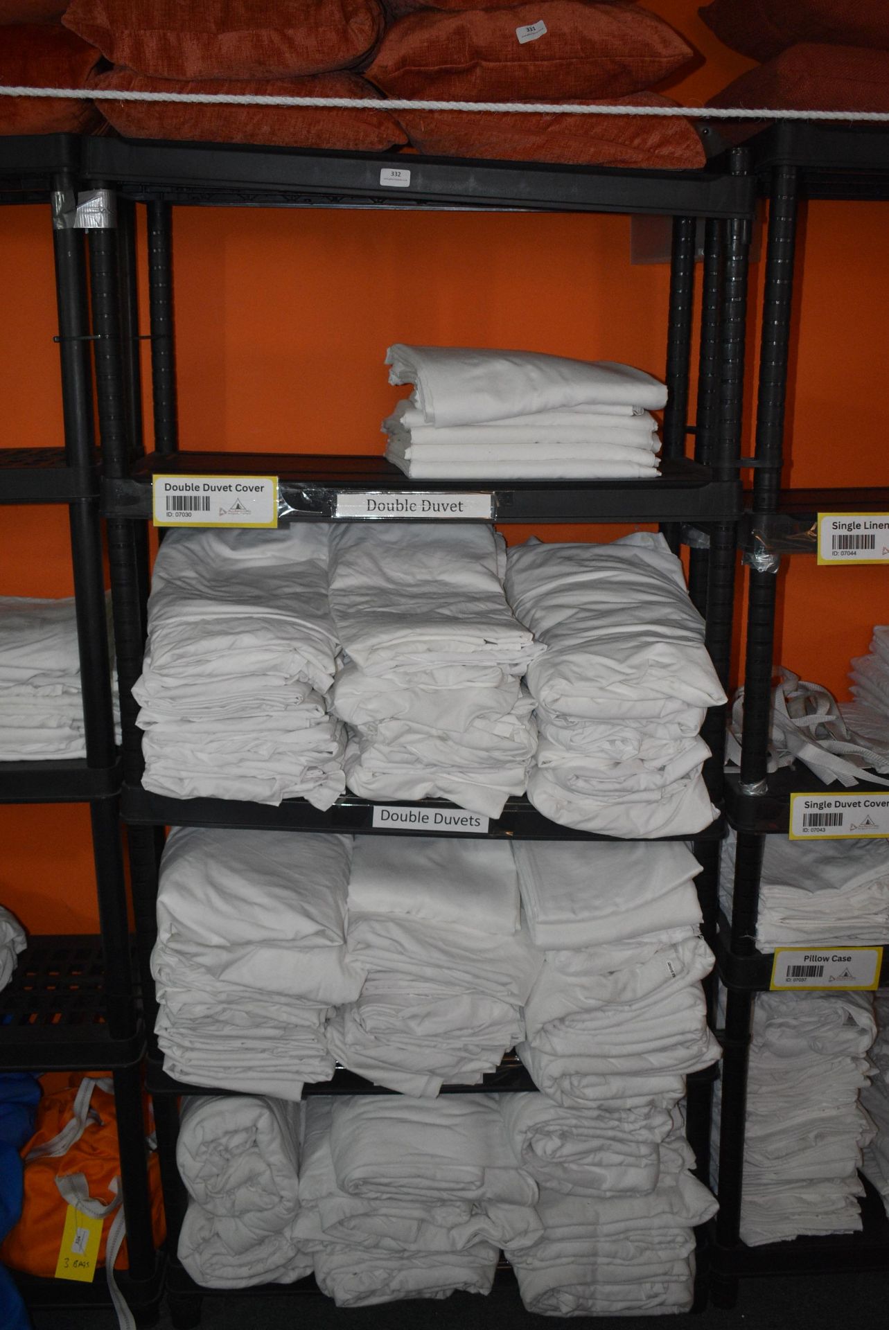*Five Tier Plastic Shelving Unit Containing Double Sheets, and Double Duvets